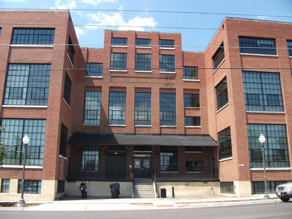 cotton mill projecting out awning windows