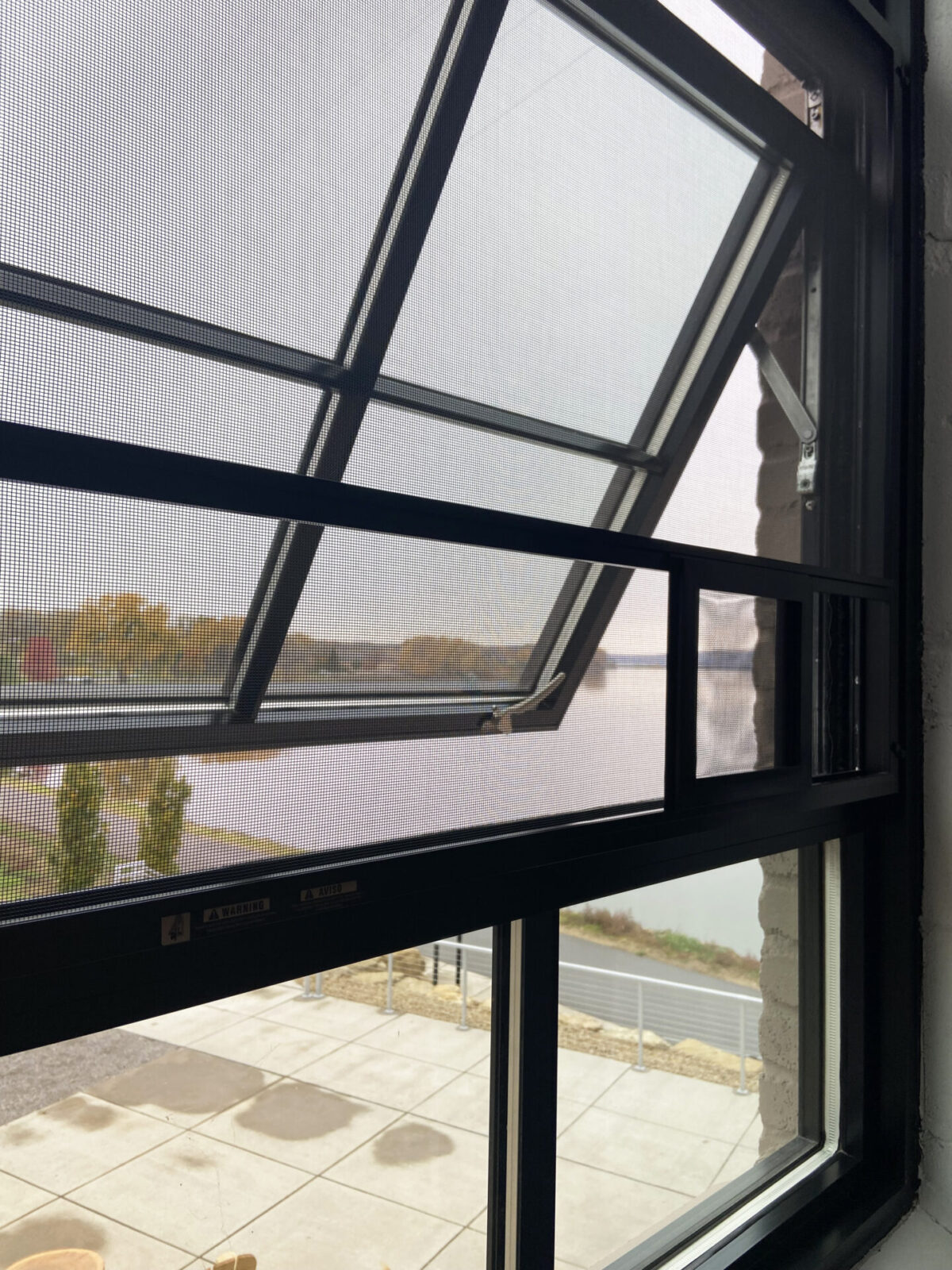 Confluence Hotel historic steel-replica awning window screen