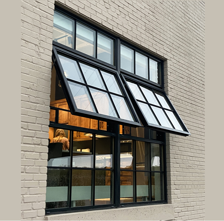 Confluence Hotel historic steel-replica awning over fixed windows