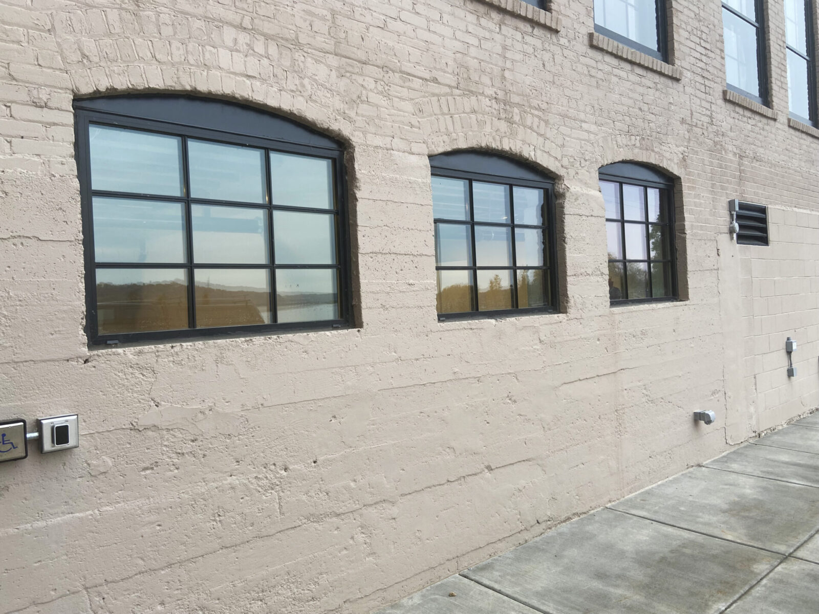 Confluence Hotel three historic steel-replica fixed windows